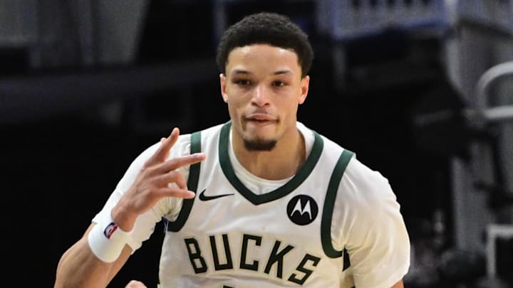 Milwaukee Bucks guard Ryan Rollins (13) reacts after scoring a 3-point basket in the 3rd quarter against the New York Knicks at Fiserv Forum. Oct 28, 2025.