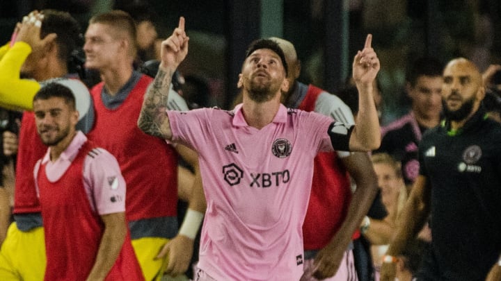 Lionel Messi celebrates after scoring the game-winning goal against Cruz Azul in his Heron debut.