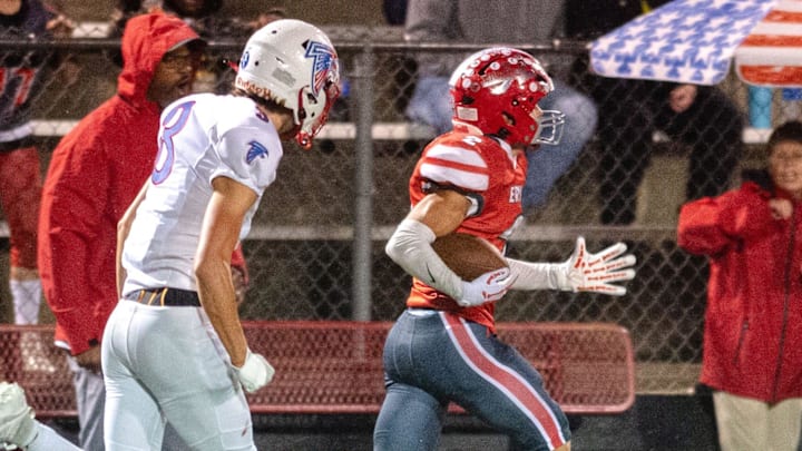 Erwin’s Lawson Reynolds runs for a touchdown in the game against West Henderson, September 12, 2024. Erwin’s Lawson Reynolds runs for a touchdown in the game against West Henderson, September 12, 2024.
