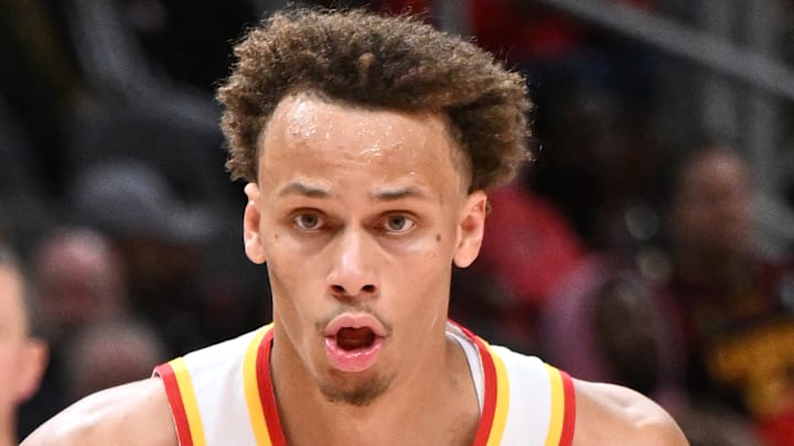 Dyson Daniels #5 of the Atlanta Hawks dribbles the ball.