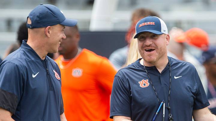 Auburn Tigers defensive coordinator D.J. Durkin and head coach Alex Golesh talk during warm ups before Auburn Tigers A-Day spring game at Jordan-Hare Stadium in Auburn, Ala. on Saturday, April 18, 2026.
