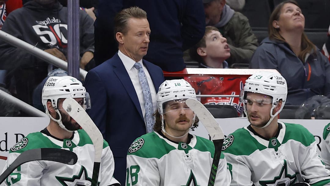 Jan 7, 2026; Washington, District of Columbia, USA; Dallas Stars head coach Glen Gulutzan looks on from behind the bench against the Washington Capitals during the third period at Capital One Arena. Mandatory Credit: Geoff Burke-Imagn Images