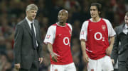 Manager Arsene Wenger, Sylvain Wiltord, and Robert Pires