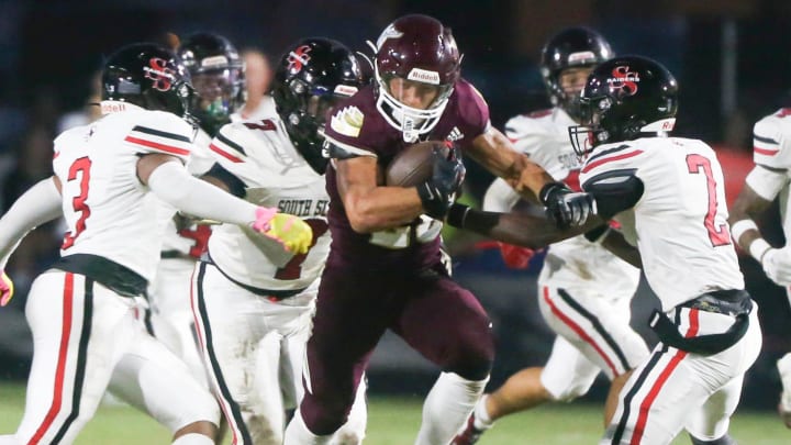 RB Connor Mathews looks for extra yardage during the Niceville South Sumter football game at Niceville.