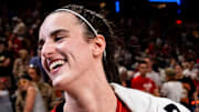 Indiana Fever guard Caitlin Clark (22) smiles in an interview after becoming the first rookie to achieve a triple-double Saturday, July 6, 2024, during the game at Gainbridge Fieldhouse in Indianapolis. The Fever defeated the Liberty, 83-78.