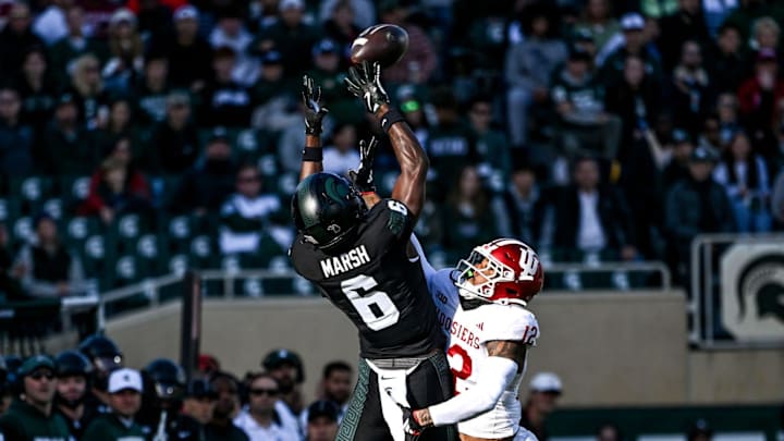 Michigan State's Nick Marsh, left, makes a catch as Indiana's Terry Jones Jr. defends during the first quarter on Saturday, Nov. 2, 2024, at Spartan Stadium in East Lansing. Michigan State's Nick Marsh, left, makes a catch as Indiana's Terry Jones Jr. defends during the first quarter on Saturday, Nov. 2, 2024, at Spartan Stadium in East Lansing.