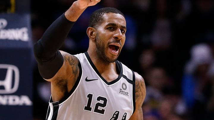Feb 10, 2020; Denver, Colorado, USA; San Antonio Spurs forward LaMarcus Aldridge (12) reacts after a play in the third quarter against the Denver Nuggets at the Pepsi Center. Mandatory Credit: Isaiah J. Downing-USA TODAY Sports