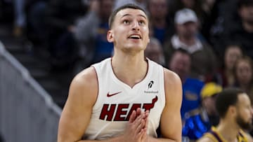 Jan 7, 2025; San Francisco, California, USA;  Miami Heat forward Nikola Jovic (5) reacts after hitting a three-point shot against the Golden State Warriors during the fourth quarter at Chase Center. Mandatory Credit: John Hefti-Imagn Images