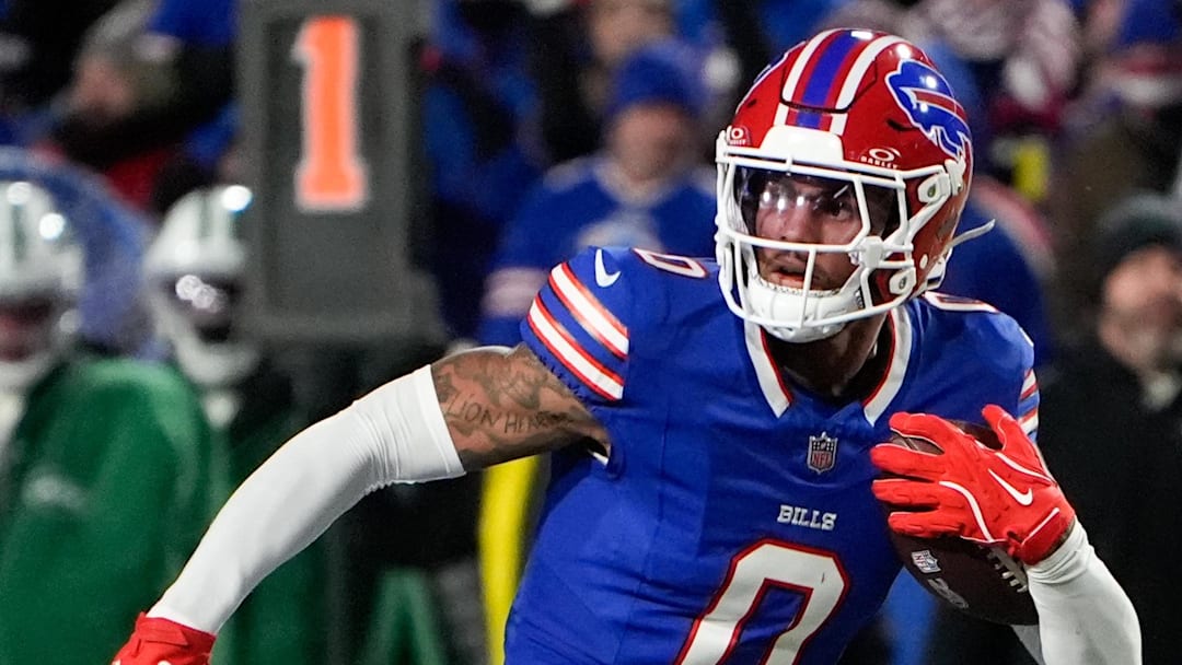 Jan 4, 2026; Orchard Park, New York, USA; Buffalo Bills wide receiver Keon Coleman (0) carries the ball against the New York Jets during the third quarter at Highmark Stadium. Mandatory Credit: Gregory Fisher-Imagn Images