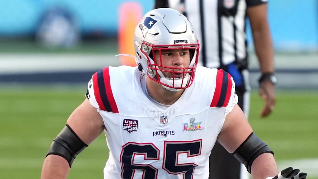 Feb 8, 2026; Santa Clara, CA, USA; New England Patriots center Garrett Bradbury (65) blocks against the Seattle Seahawks during the first quarter in Super Bowl LX at Levi's Stadium. Mandatory Credit: Darren Yamashita-Imagn Images