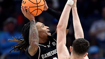 South Carolina guard Jamarii Thomas (6) drives tot he basket against Arkansas forward Zvonimir Ivisic (44) during a NCAA college basketball first round game at the men’s Southeastern Conference Tournament Wednesday, March 12, 2025, in Nashville, Tenn.