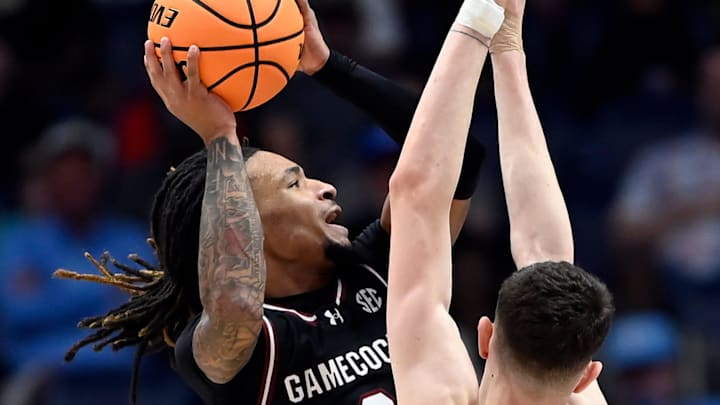South Carolina guard Jamarii Thomas (6) drives tot he basket against Arkansas forward Zvonimir Ivisic (44) during a NCAA college basketball first round game at the men’s Southeastern Conference Tournament Wednesday, March 12, 2025, in Nashville, Tenn.