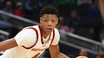 Mar 12, 2025; Indianapolis, IN, USA; Rutgers Scarlet Knights guard Ace Bailey (4) goes to the basket during the first half against the USC Trojans at Gainbridge Fieldhouse. Mandatory Credit: Robert Goddin-Imagn Images