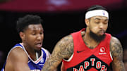 Toronto Raptors forward Brandon Ingram dribbles against Philadelphia 76ers forward Justin Edwards.