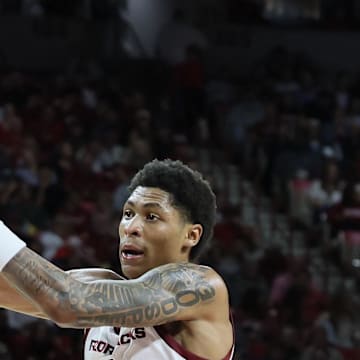 Arkansas Razorbacks guard Meleek Thomas (1) passes during the second half against the Cincinnati Bearcats at Bud Walton Arena. Arkansas won 89-61. 