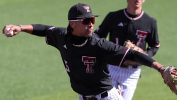 Texas Tech's TJ Pompey prepares to throw to first against UC Irvine during a non-conference Division I baseball game, Friday, Feb. 21, 2025, at Dan Law Field.