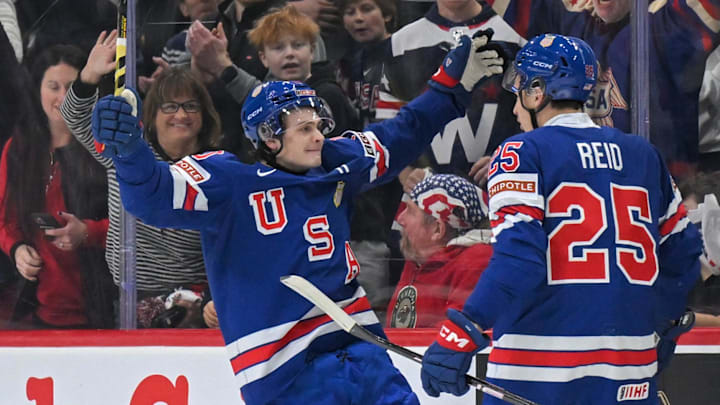 Dec 31, 2025; St. Paul, Minnesota, USA; USA defensemen Chase Reid celebrates his power play goal against Sweden with forward James Hagens during the second period in group play during the 2026 IIHF World Junior Championship at Grand Casino Arena. Dec 31, 2025; St. Paul, Minnesota, USA; USA defensemen Chase Reid celebrates his power play goal against Sweden with forward James Hagens during the second period in group play during the 2026 IIHF World Junior Championship at Grand Casino Arena.
