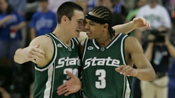 Michigan State University's (3) Shannon Brown gets a hug from teammate Tim Bograkos, left, as Brown comes out of the game  in their win over Kentucky in  their NCAA regional final on Sunday Mar 27, 2005 in Austin, Texas.

Msu 032705 Ky Jhg10