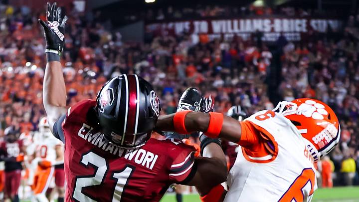 Nov 25, 2023; Columbia, South Carolina, USA; South Carolina Gamecocks defensive back Nick Emmanwori (21) intercepts a pass intended for Clemson Tigers wide receiver Tyler Brown (6) in the second half at Williams-Brice Stadium. Mandatory Credit: Jeff Blake-Imagn Images