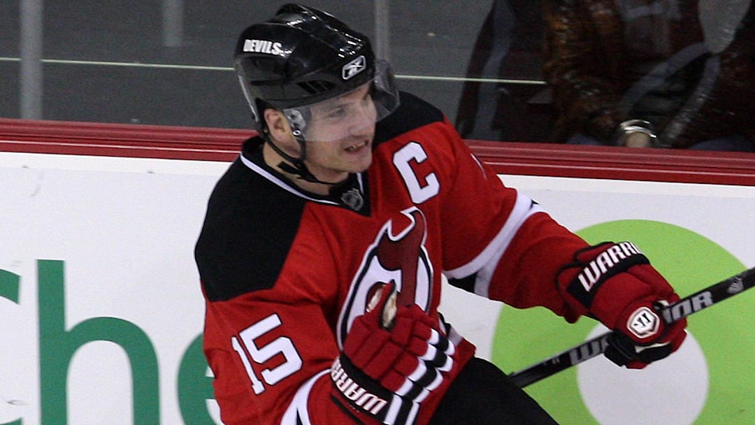 Mar 25, 2010; Newark, NJ, USA; New Jersey Devils right wing Jamie Langenbrunner (15) celebrates after scoring during the third period against the New York Rangers at the Prudential Center. The Rangers won 4-3 in a shootout.  Mandatory Credit: Ed Mulholland-Imagn Images