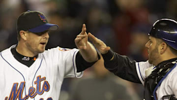 Oct 12, 2006; Flushing, NY, USA; New York Mets pitcher (13) Billy Wagner celebrates with catcher (16) Paul Lo Duca after recording the last out of game one of the National League Championship Series against the St. Louis Cardinals at Shea Stadium in Flushing, NY. The Mets defeated the Cardinals 2-0.
