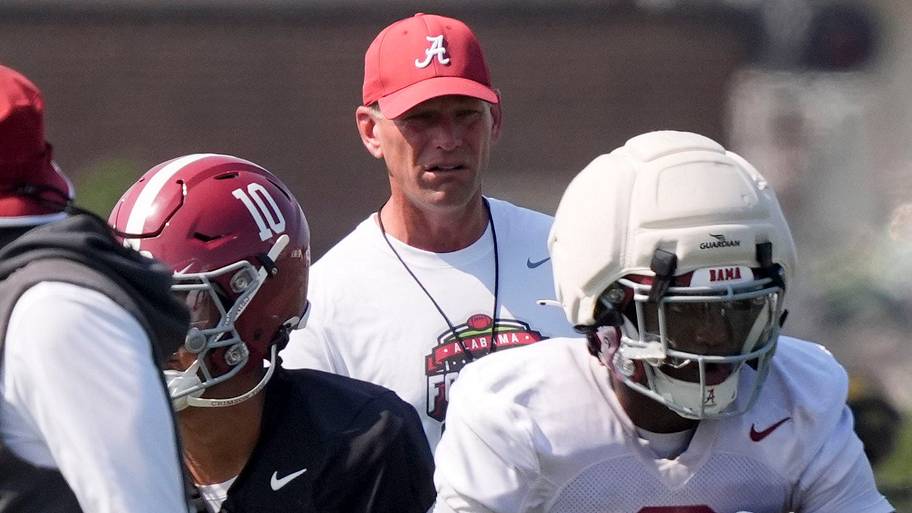Coach Kalen DeBoer watches the quarterbacks and running backs during the Alabama Crimson Tide’s first open practice.