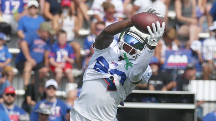 Bills wide receiver Tyrell Shavers goes up to get a pass across the middle during route drills.