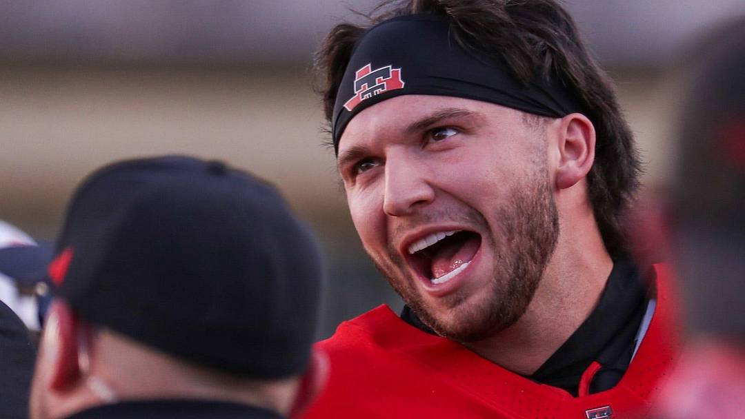 Brendan Sorsby talks to coaches during Texas Tech's spring football game in mid-April.