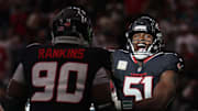 Nov 9, 2025; Houston, Texas, USA; Houston Texans defensive end Will Anderson Jr. (51) reacts with defensive tackle Sheldon Rankins (90) after a defensive play against the Jacksonville Jaguars during the second half at NRG Stadium. Mandatory Credit: Thomas Shea-Imagn Images