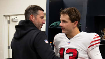 San Francisco 49ers head coach Kyle Shanahan (L) and quarterback Brock Purdy (R)