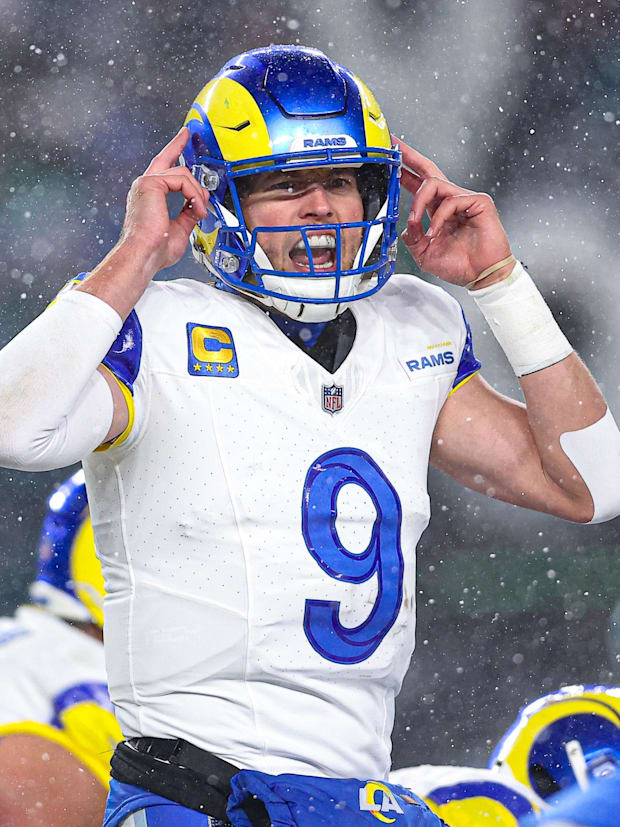 Los Angeles Rams quarterback Matthew Stafford calls a play at the one of scrimmage against the Philadelphia Eagles. 