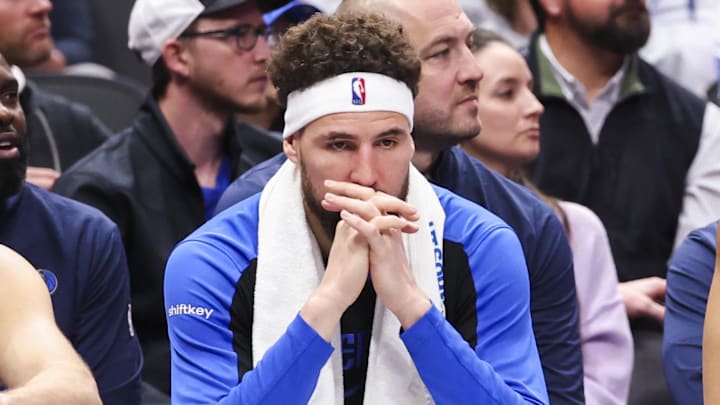 Jan 3, 2025; Dallas, Texas, USA;  Dallas Mavericks guard Klay Thompson (31) and Dallas Mavericks guard Spencer Dinwiddie (26) react on the bench during the fourth quarter against the Cleveland Cavaliers at American Airlines Center. Mandatory Credit: Kevin Jairaj-Imagn Images