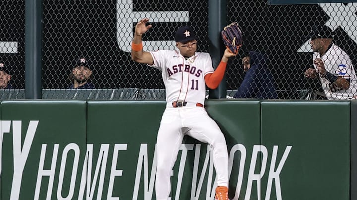 Mar 28, 2026; Houston, Texas, USA;  Houston Astros right fielder Cam Smith (11) catches Los Angeles Angels center fielder Mike Trout (27) (not pictured) fly ball in the first inning at Daikin Park. Mandatory Credit: Thomas Shea-Imagn Images