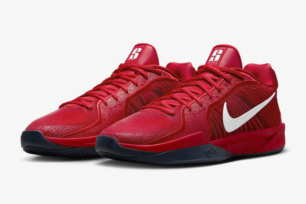 Sabrina Ionescu's red and white Nike sneakers.