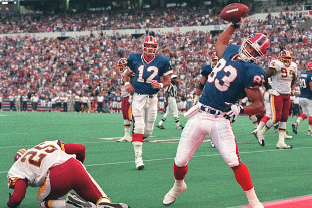 Buffalo Bills former wide receiver Andre Reed scores a touchdown.