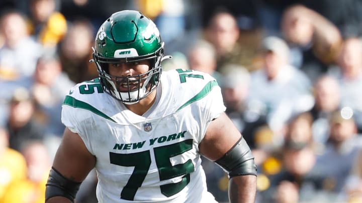 Oct 2, 2022; Pittsburgh, PA;  New York Jets guard Alijah Vera-Tucker (75) blocks at the line of scrimmage against the Pittsburgh Steelers during the fourth quarter at Acrisure Stadium.  