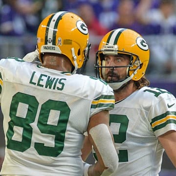 Green Bay Packers quarterback Aaron Rodgers and tight end Marcedes Lewis in action against the Minnesota Vikings.