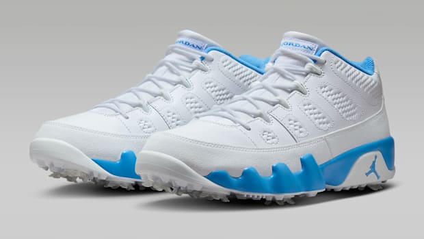 Blue and white Air Jordan golf shoes.