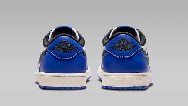 Blue, black, and white Air Jordan 1 Low sneakers.
