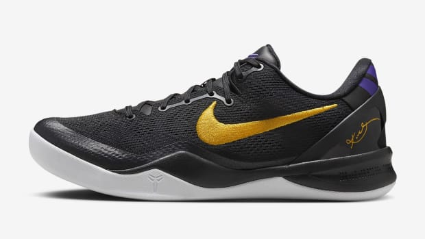 Kobe Bryant's black and gold Nike sneakers.