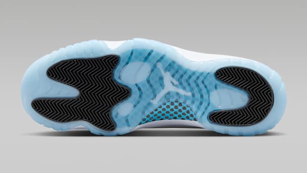 White jordans with blue bottom hotsell