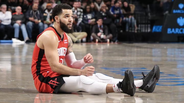 Jan 27, 2024; Brooklyn, New York, USA; Houston Rockets guard Fred VanVleet (5) watches the play after falling down in the third quarter against the Brooklyn Nets at Barclays Center. Mandatory Credit: Wendell Cruz-Imagn Images