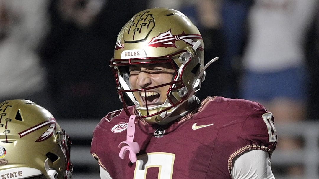 Nov 1, 2025; Tallahassee, Florida, USA; Florida State Seminoles quarterback Tommy Castellanos (1) celebrates a touchdown with wide receiver Duce Robinson (0) during the second half against the Wake Forest Demon Deacons at Doak S. Campbell Stadium. Mandatory Credit: Melina Myers-Imagn Images