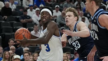 BYU forward AJ Dybantsa drives past Villanova forward Matt Hodge during their season opener.