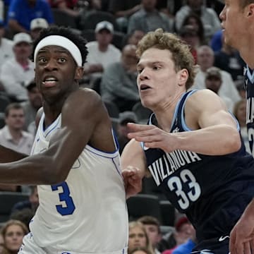 BYU forward AJ Dybantsa drives past Villanova forward Matt Hodge during their season opener.