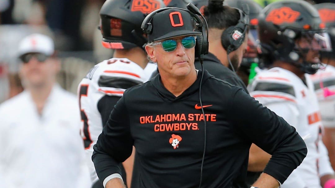 Oklahoma State interim football coach Doug Meacham walks the sideline in a Big 12 game against Texas Tech on Saturday, Oct. 25, 2025, at Jones AT&T Stadium.