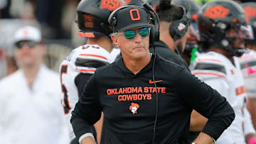 Oklahoma State interim football coach Doug Meacham walks the sideline in a Big 12 game against Texas Tech on Saturday, Oct. 25, 2025, at Jones AT&T Stadium.