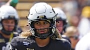 Sep 6, 2025; Boulder, Colorado, USA; Colorado Buffaloes quarterback Julian Lewis (10) before the game against the Delaware Fightin Blue Hens at Folsom Field.