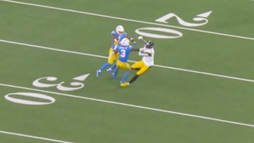 DK Metcalf was not called for a charge here. 