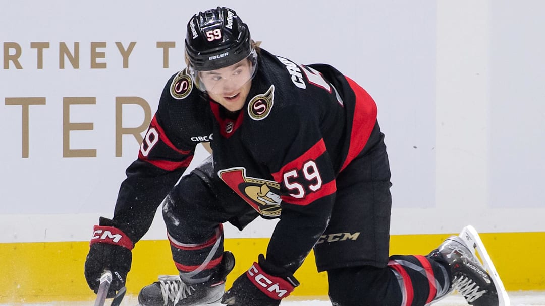 Mar 24, 2024; Ottawa, Ontario, CAN; Ottawa Senators left wing Angus Crookshank (59) falls to the ice in the first period against the Edmonton Oilers at the Canadian Tire Centre. Mandatory Credit: Marc DesRosiers-Imagn Images Mar 24, 2024; Ottawa, Ontario, CAN; Ottawa Senators left wing Angus Crookshank (59) falls to the ice in the first period against the Edmonton Oilers at the Canadian Tire Centre. Mandatory Credit: Marc DesRosiers-Imagn Images